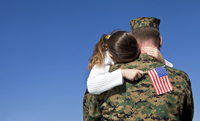 Military-Hero-Image-200 Soldier holding their child